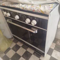 اجاق گاز طرح فر پنج شعله فندک دار یک هفته کار کرده