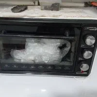 توستر سفیدو مشکی تمیز جوجه گردان هم دارد