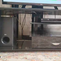 میز زیر تلویزیونی شیشه ای