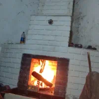 طراحی و اجرای شومینه هیزمی و اتشکده