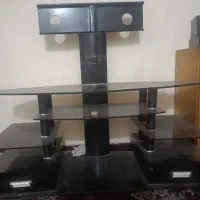 زیر تلویزیون شیشه ای