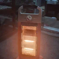 یک عدد بخاری برقی ایستاده . چراغ نفتی .بخاری نفتی