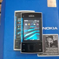 نوکیا X3 دارای کارتن و شارژر