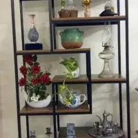 استند فلزی قفسه کتابخانه استند گل(فروشگاه قبادی)