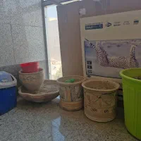 گلدان سفالی و خاک