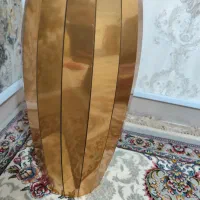 گلدان چوبی کنار سالنی