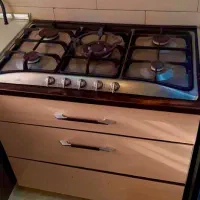 گاز اخوان ۵شعله کاملا سالم با کابینت ۳کشو تمام MDF