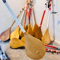 دمبوره هزارگی و قطغنی|سازهای سنتی|باقرشهر, |دیوار