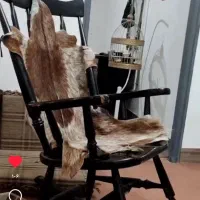 یک عدد صندلی راحتی را یا مادر بزرگ