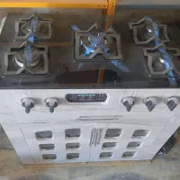 اجاق گاز پنج شعله درب طرح ام دی آف  نو  با کارتون