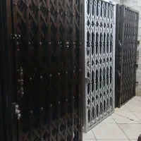 حفاظ آکاردئونی.کرکره برقی کشویی درب ضد سرقت.پنجره