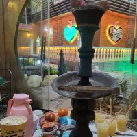 کارگر ساده،کار در باغ رستوران ماه عسل ،