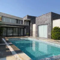 تهاتر،خرید،اقساط / باغ باغچه ویلا با واحد