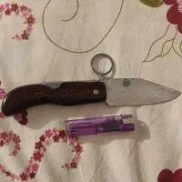 چاقو دسته شاخ .اره دار.موقعیت سامان.|کلکسیون اشیاء عتیقه|سامان, |دیوار