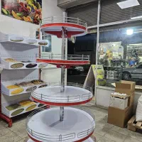 استند قفسه گرد وسط فروشگاهی