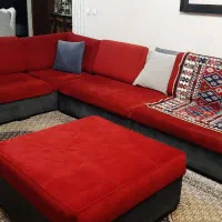 مبل ۹نفره ال دو رنگ زرشگی و طوسی و پاف جلو مبل