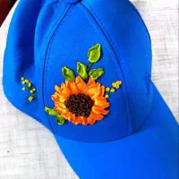 کلاه گلدار|کیف، کفش، کمربند|رشت, کوی حسینی|دیوار