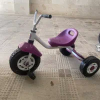 سه چرخه و اسب گهواره ای