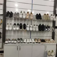 دکور مغازه کفش و کیف