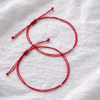 دستبند رد استرینگ‌