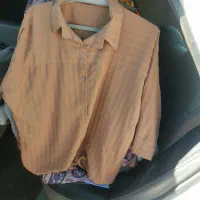 لباس ۲۰۰ ت.و م ن ی