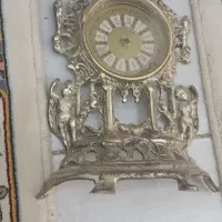 سا عت اینه و شمعدان