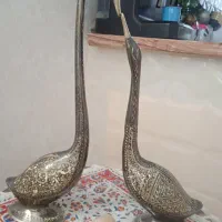 قو عاشق برنجی|مجسمه، تندیس، ماکت|تربت‌حیدریه, طالقانی|دیوار