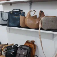 کیف|کیف، کفش، کمربند|بندر دیر, |دیوار