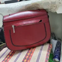 کیف چرم‌ گاوی زرشکی. کار دست|کیف، کفش، کمربند|مشهد, دانشجو|دیوار