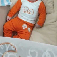 تعدادی لباس نوزادی