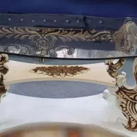 میز عسلی،گل مصنوعی،دراور،حلقه ی ورزشی و سطل زباله