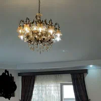 لوستر ۲۰ شاخه روشنایی برنجی طرح فرشته