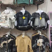 لباس بچه|کفش و لباس بچه|قم, زاویه|دیوار