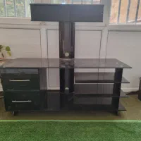 میز تلویزیون شیشه ای  دودی کشو دار