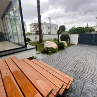 ویلا-نما-مدرن-حیاط-سازی-شده