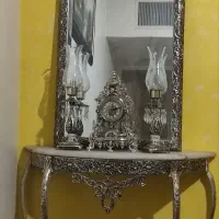 اینه و شمعدان و ساعت برنزی