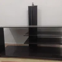 زیر تلویزیونی شیشه ای