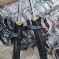 کمک و فنر لول