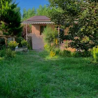 ویلا باغ   در بست بزرگ دوخوابه مبله  با پارکینگ