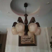 فروش لوستر و ساعت..