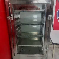 یک دستگاه گرمخانه و ذرت پز