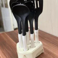 ظروف نو|ظروف پخت‌وپز|قم, بنیاد|دیوار
