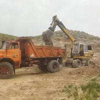 انجام کار بیل لودر کمپرسی