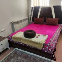 تخت خواب دونفره جنس چوب با روکش چرم