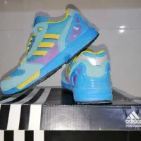آدیداس فیروزه ای