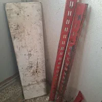 میز اتو و قفسه مغازه