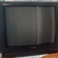 تلویزیون ۲۱ شهاب همراه با میز چوبی شیشه دار