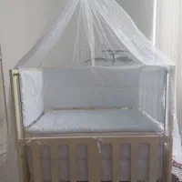 تخت گهواره ای نوزاد
