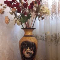 گلدان جنس سفال وروش کارشده باگلهای مصنوعی که خارجی