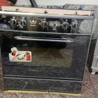 اجاق گاز پنج شعله نو آکبند با کارتون